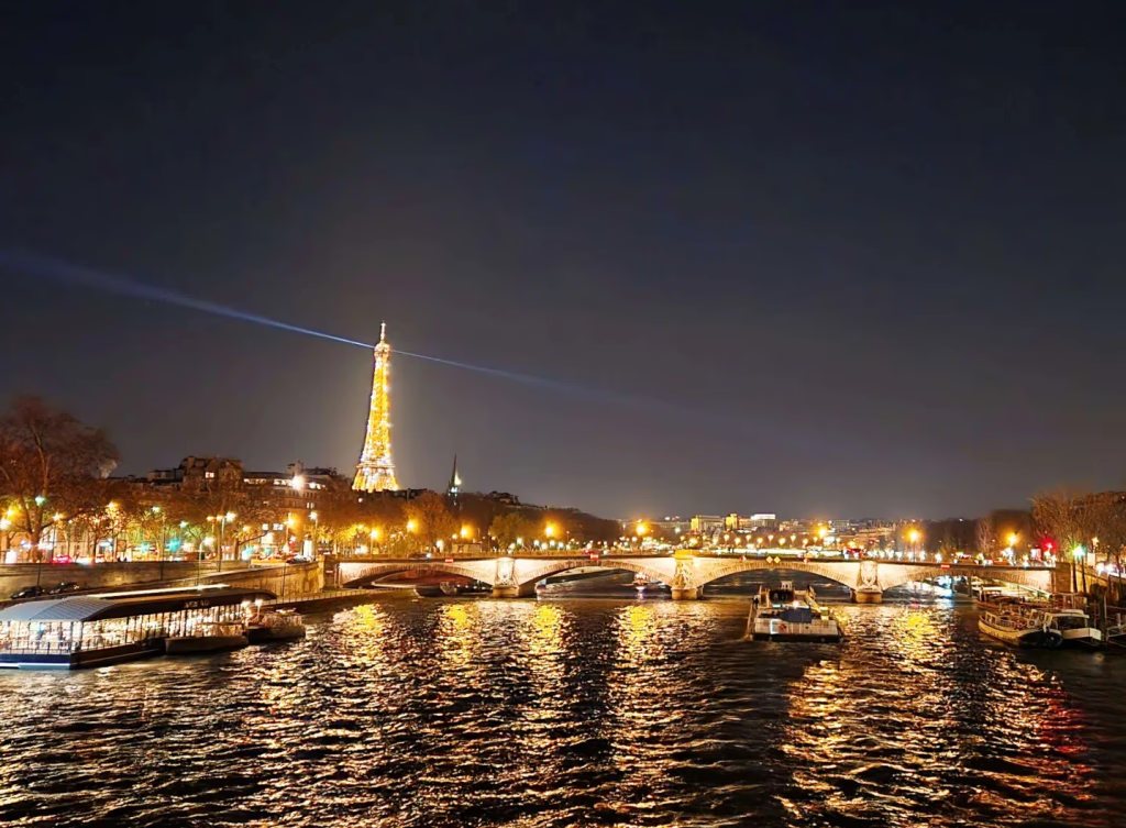 The Eiffel Tower sparkling at night in Paris